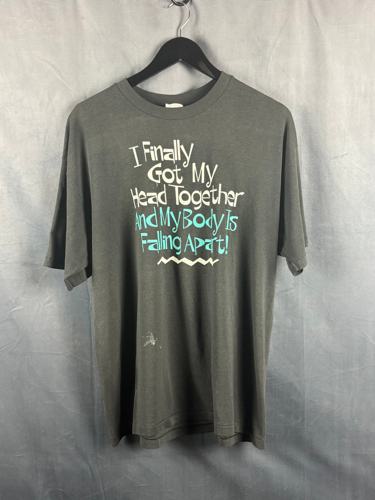 “I finally got my head together and my body is falling apart” t-shirt size XL